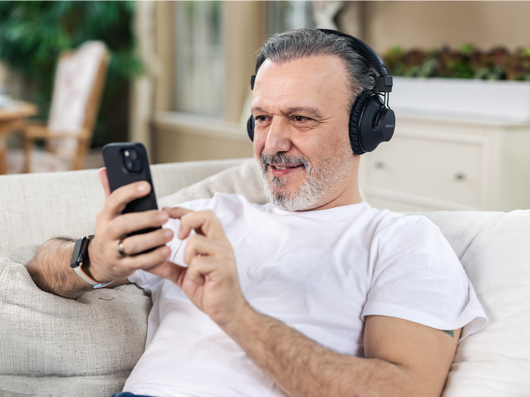 Audition 3 Bluetooth over-ear headphones with wireless charging dock, aptX HD, lightweight comfort, and durable build.