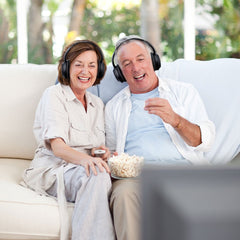 Opera Wireless TV Headphones with transmitter and charging dock, ideal for seniors, providing louder listening volume than standard headphones.