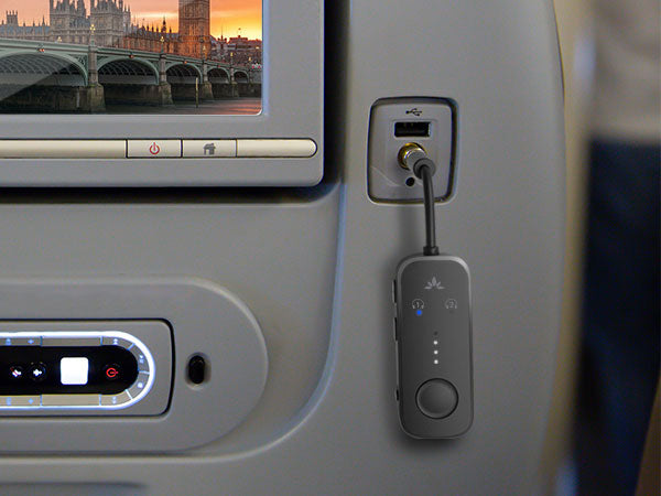 Relay Bluetooth Adapter for Airplanes, connects to airplane seatback screens via 3.5mm AUX and streams audio to Bluetooth headphones.