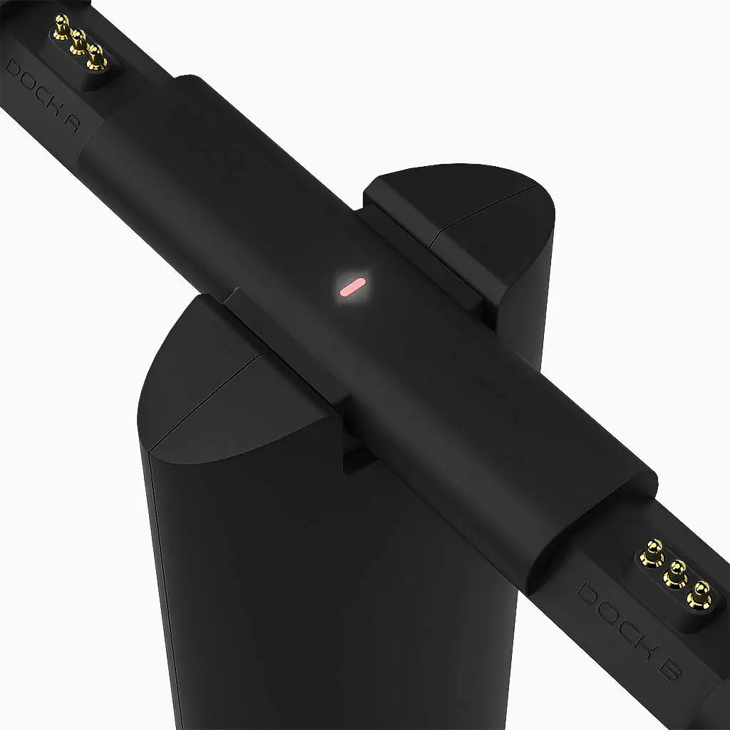Duet Dual Wireless Headphones for TV, 2.4G connection, transmitter works as charging base; place headphones on transmitter to charge.