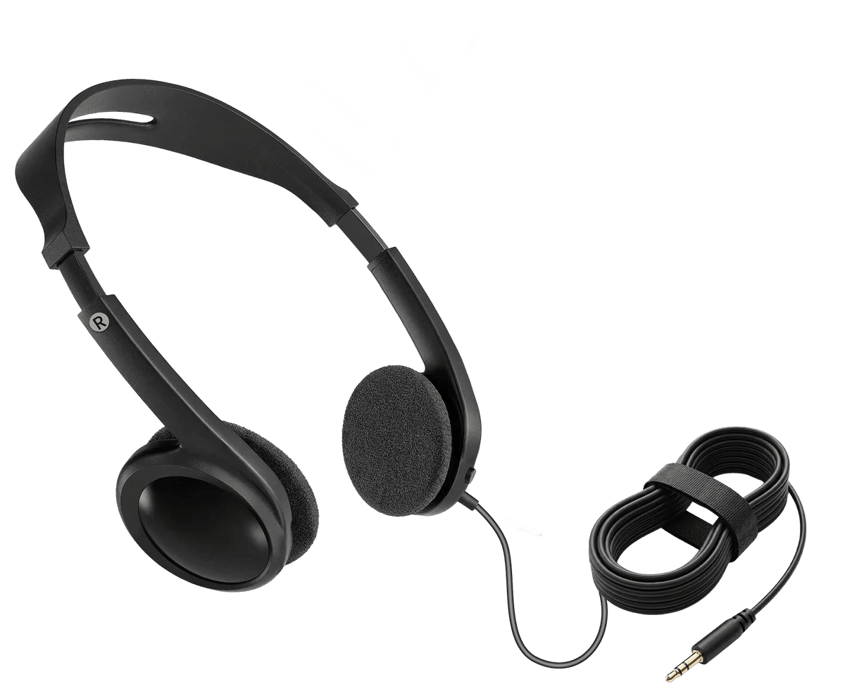 Headphones worn over hearing aids